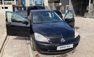 Mitsubishi Lancer 2009 года за 2 900 000 тг. в Талдыкорган фото 2