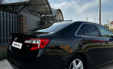Toyota Camry 2014 года за 7 500 000 тг. в Актобе фото 4