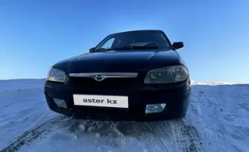 Mazda 323 1999 года за 1 600 000 тг. в Караганда фото 1