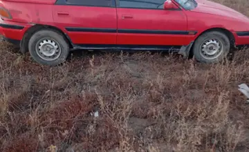 Mazda 323 1993 года за 850 000 тг. в Астана фото 2