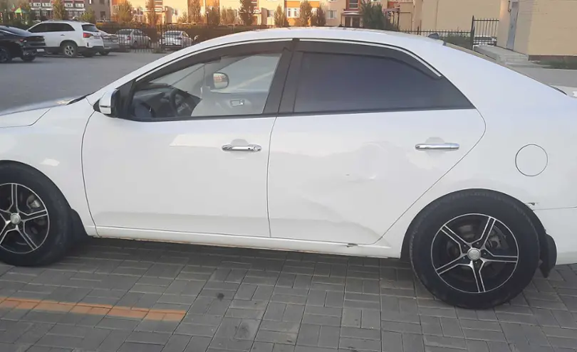 Kia Cerato 2012 года за 4 500 000 тг. в Актюбинская область фото 4