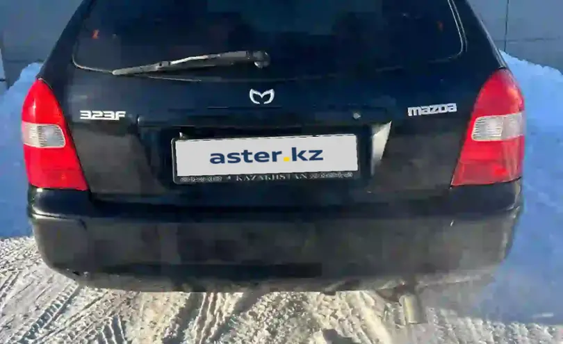 Mazda 323 1999 года за 1 500 000 тг. в Караганда фото 3