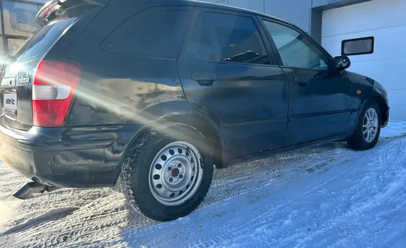 Mazda 323 1999 года за 1 500 000 тг. в Караганда фото 2