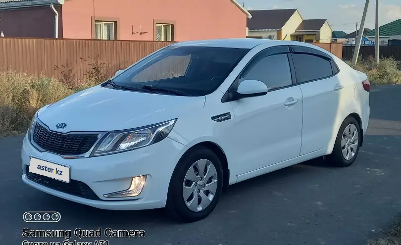 Kia Rio 2014 года за 4 700 000 тг. в Атырауская область фото 1