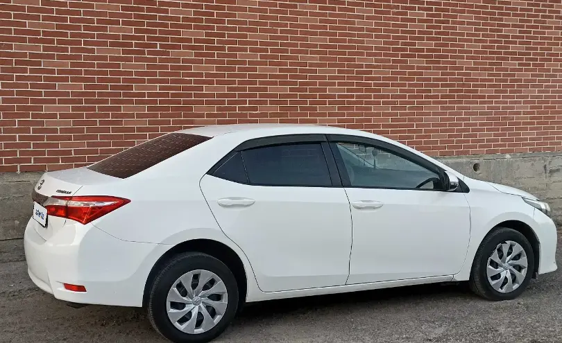 Toyota Corolla 2014 года за 5 300 000 тг. в Алматы фото 2