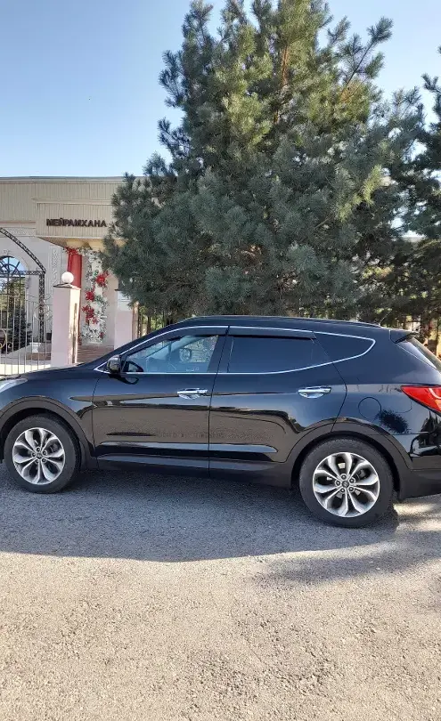 Hyundai Santa Fe 2013 года за 9 100 000 тг. в Жетысуская область фото 2