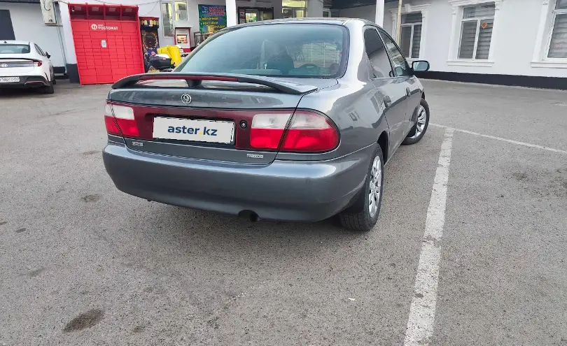 Mazda 323 1994 года за 1 800 000 тг. в Алматы фото 5