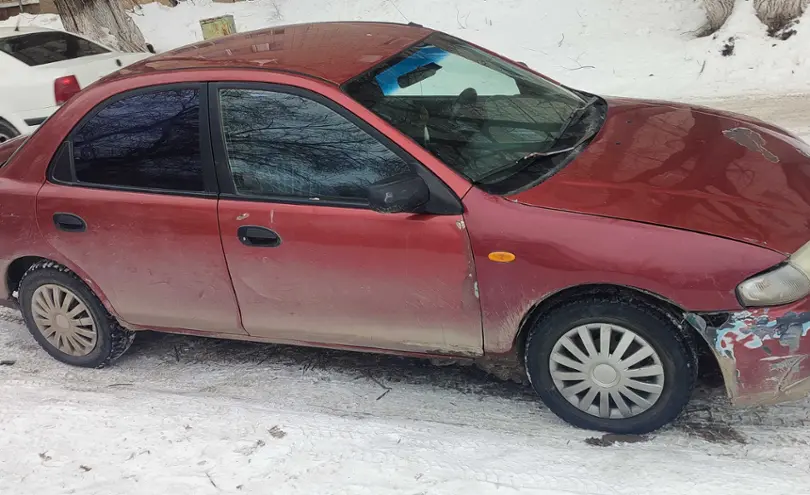 Mazda 323 1997 года за 700 000 тг. в Астана фото 3