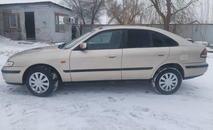 Mazda 626 1998 года за 1 700 000 тг. в Актюбинская область фото 4