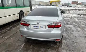 Toyota Camry 2014 года за 11 800 000 тг. в Астана фото 4