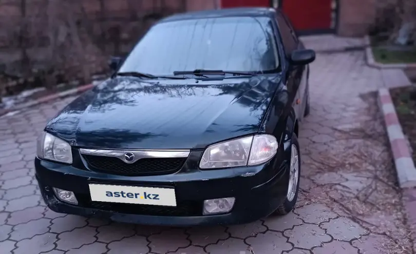 Mazda 323 1998 года за 1 800 000 тг. в Жамбылская область фото 2