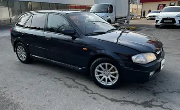 Mazda 323 1998 года за 1 800 000 тг. в Алматы фото 3