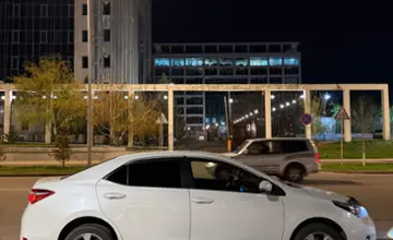 Toyota Corolla 2015 года за 6 900 000 тг. в Астана фото 2