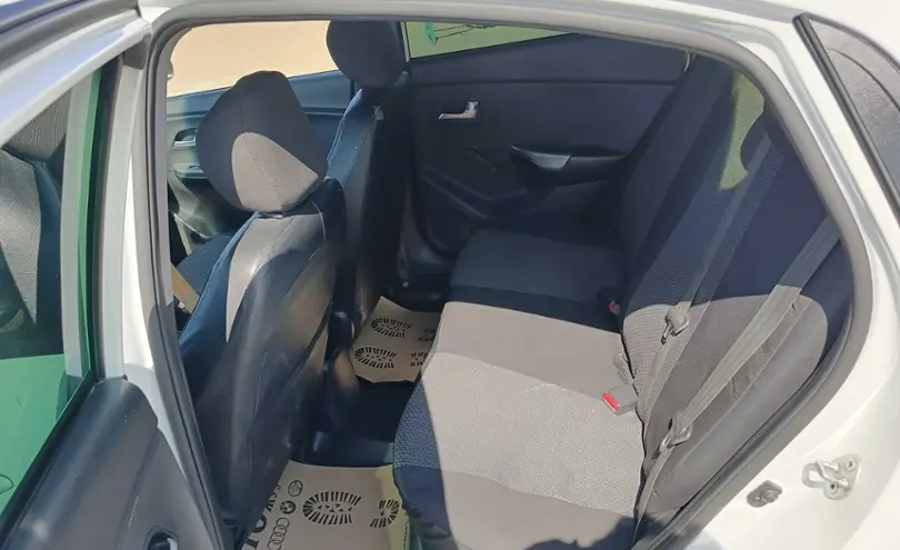 Kia Rio 2013 года за 4 300 000 тг. в Караганда фото 5