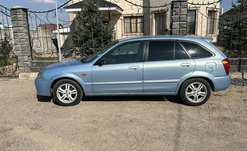 Mazda 323 2002 года за 1 500 000 тг. в Алматы фото 5