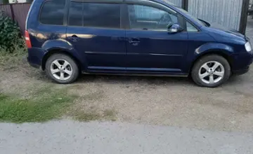 Volkswagen Touran 2005 года за 4 200 000 тг. в Астана фото 2
