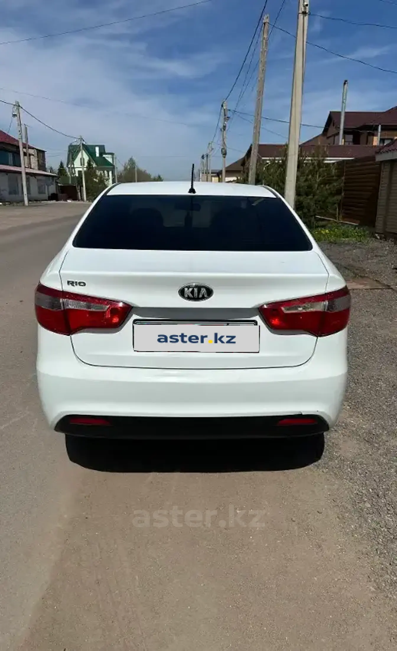 Kia Rio 2014 года за 4 900 000 тг. в Караганда фото 4