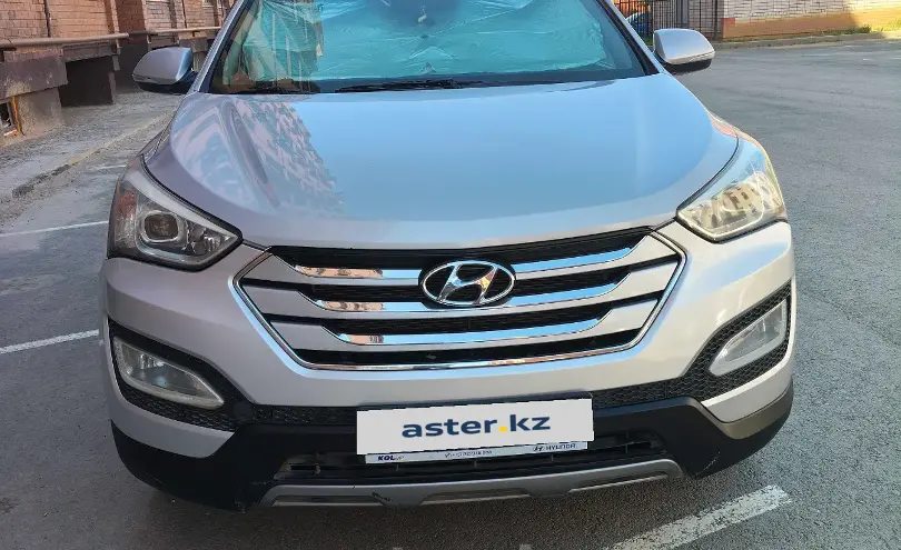 Hyundai Santa Fe 2014 года за 8 500 000 тг. в Актобе