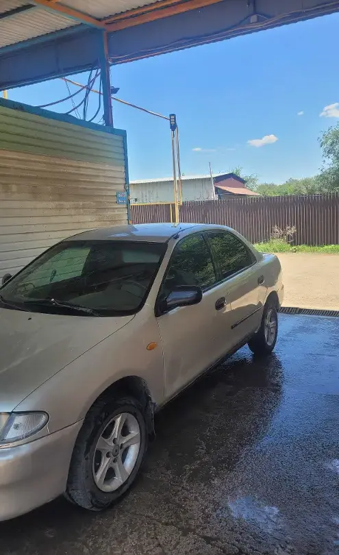 Mazda 323 1996 года за 850 000 тг. в Алматы фото 2