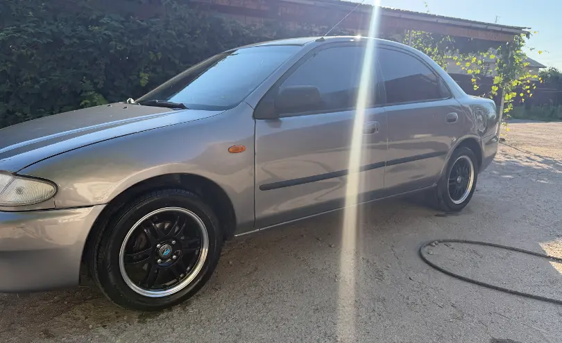 Mazda 323 1994 года за 1 100 000 тг. в Алматинская область фото 2