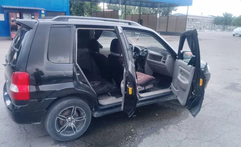 Mazda Demio 2002 года за 1 500 000 тг. в Алматы