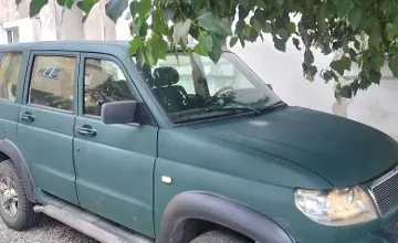 УАЗ Patriot 2011 года за 2 600 000 тг. в Карагандинская область фото 1