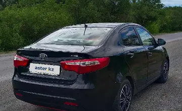 Kia Rio 2015 года за 4 200 000 тг. в Караганда фото 4