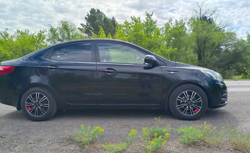 Kia Rio 2015 года за 3 800 000 тг. в Караганда фото 3