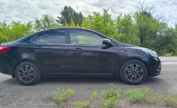 Kia Rio 2015 года за 4 200 000 тг. в Караганда фото 3