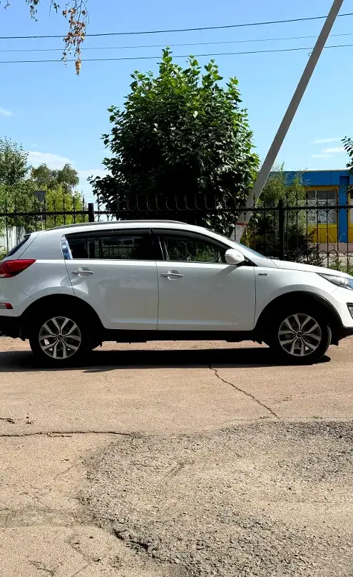 Kia Sportage 2015 года за 6 890 000 тг. в Астана фото 4