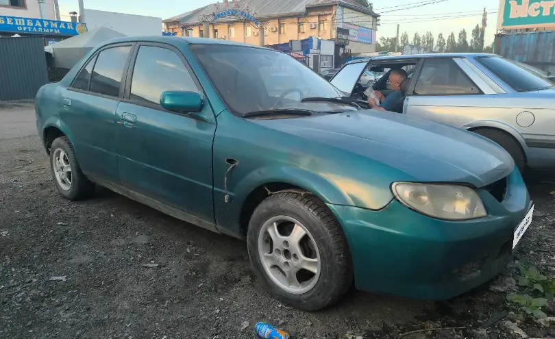 Mazda 323 2002 года за 550 000 тг. в Астана фото 2