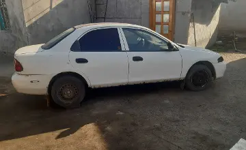 Mazda 323 1997 года за 330 000 тг. в Алматинская область фото 3