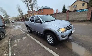 Mitsubishi L200 2012 года за 5 700 000 тг. в Астана фото 2