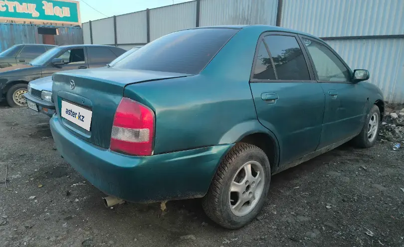 Mazda 323 2002 года за 550 000 тг. в Астана фото 3