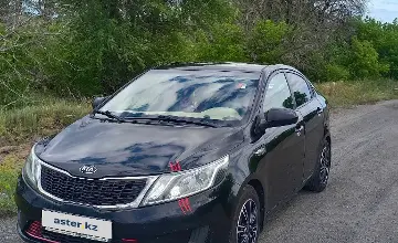 Kia Rio 2015 года за 4 200 000 тг. в Караганда фото 1