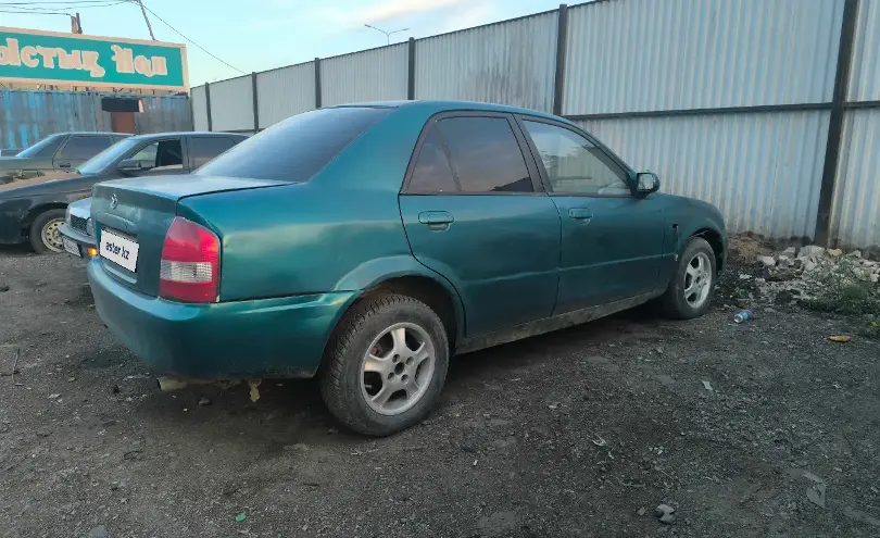 Mazda 323 2002 года за 550 000 тг. в Астана фото 4