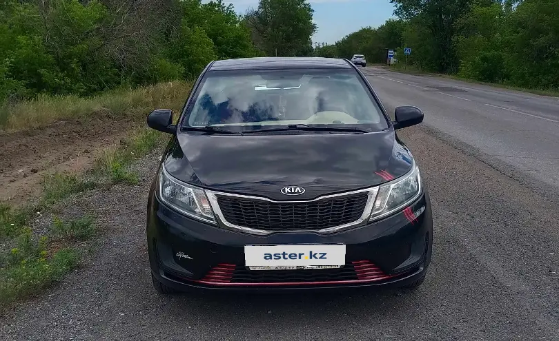 Kia Rio 2015 года за 3 800 000 тг. в Караганда фото 2