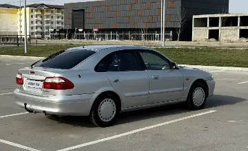 Mazda 626 2000 года за 2 100 000 тг. в Алматы фото 4