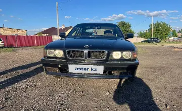 BMW 7 серии 1998 года за 1 700 000 тг. в Караганда фото 1