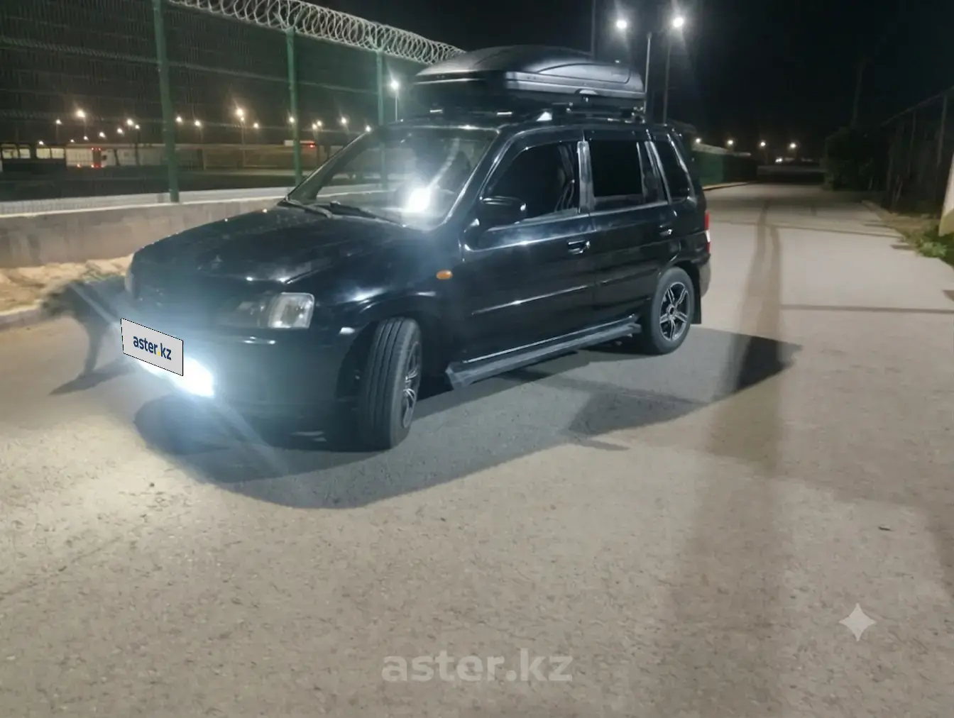 Mazda Demio, 2003