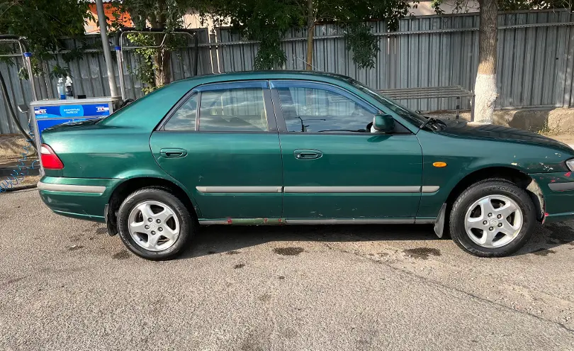 Mazda 626 1997 года за 1 600 000 тг. в Алматы фото 2