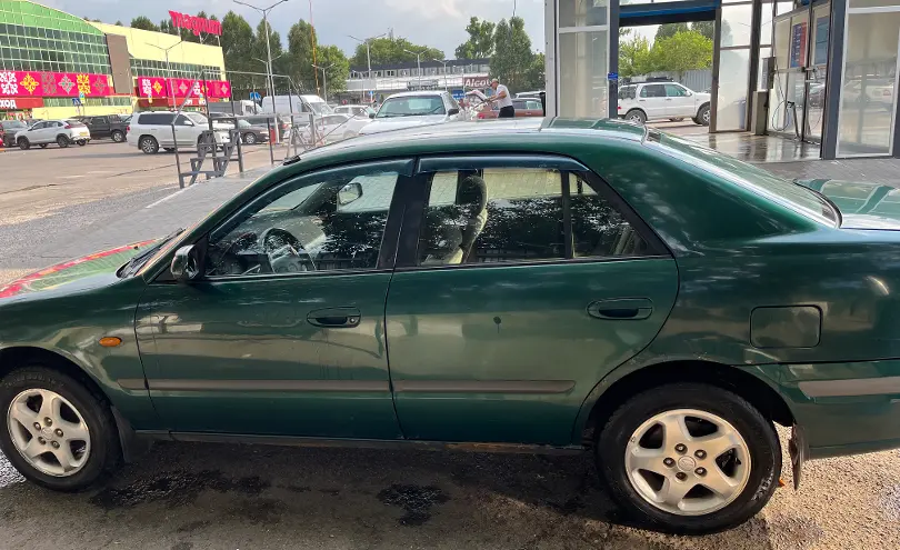 Mazda 626 1997 года за 1 600 000 тг. в Алматы фото 4