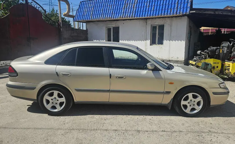 Mazda 626 1998 года за 1 800 000 тг. в Алматы фото 2